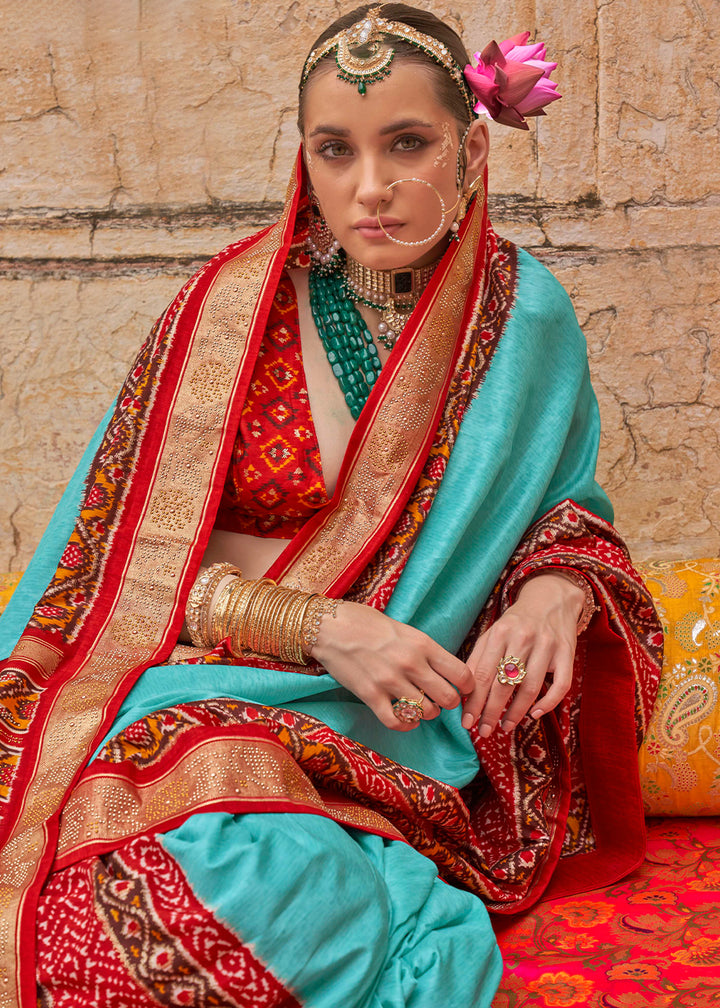Turquoise Blue Patola Print Viscose Silk Saree with Dew Drops & Studs