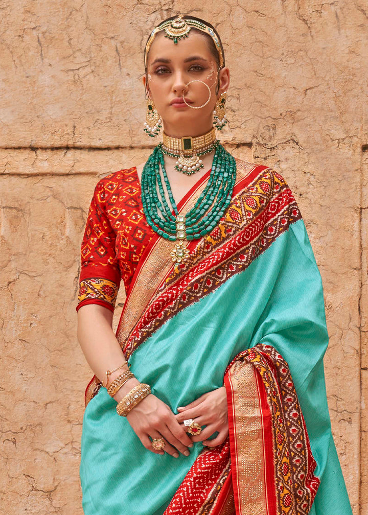 Turquoise Blue Patola Print Viscose Silk Saree with Dew Drops & Studs