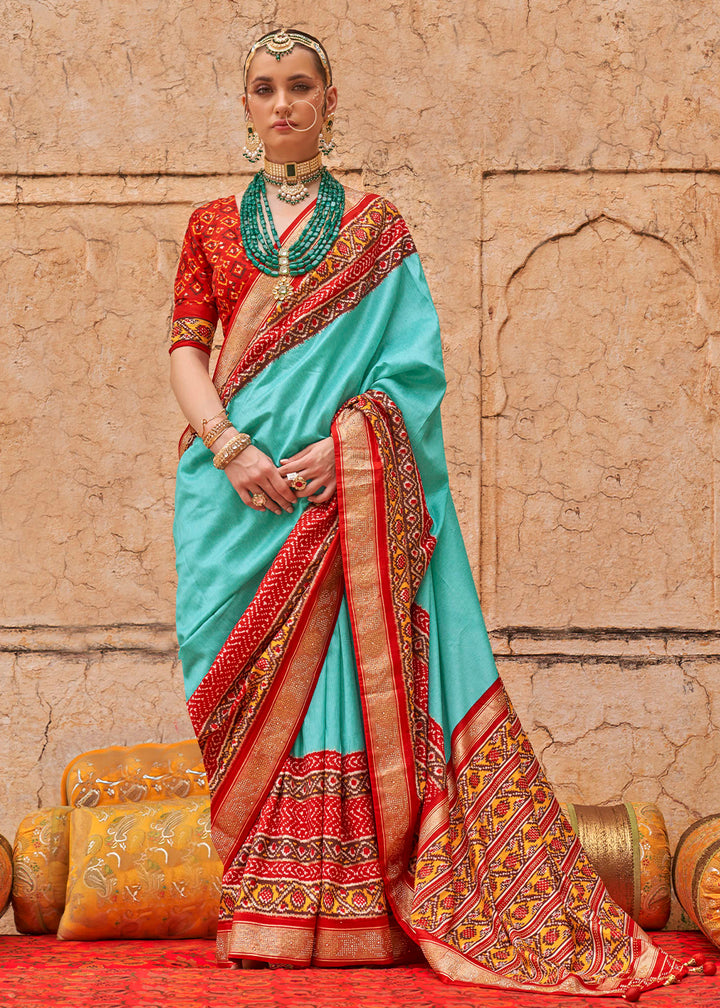Turquoise Blue Patola Print Viscose Silk Saree with Dew Drops & Studs
