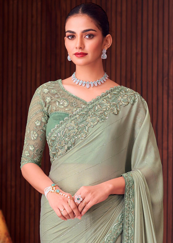 Tea Green Silk Saree with Rich Thread Embroidery & Embellishments