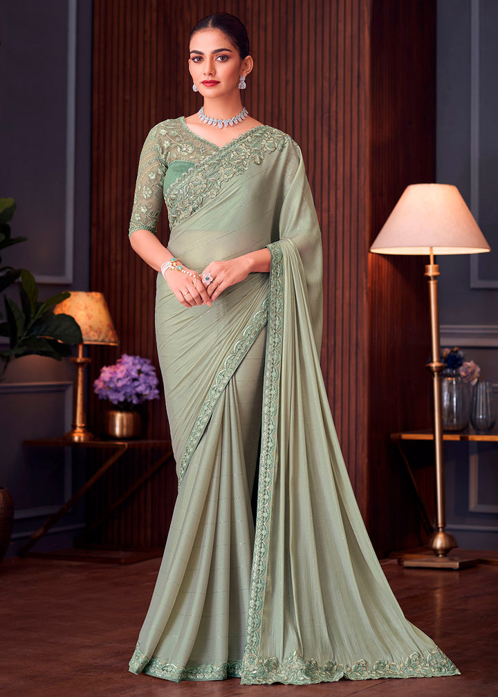 Tea Green Silk Saree with Rich Thread Embroidery & Embellishments