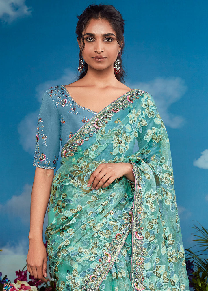 Turquoise Blue Floral Brasso Silk Saree with Embroidered Border Detailing