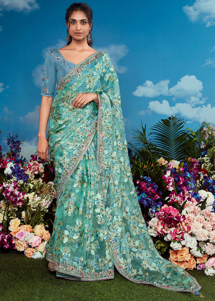 Turquoise Blue Floral Brasso Silk Saree with Embroidered Border Detailing