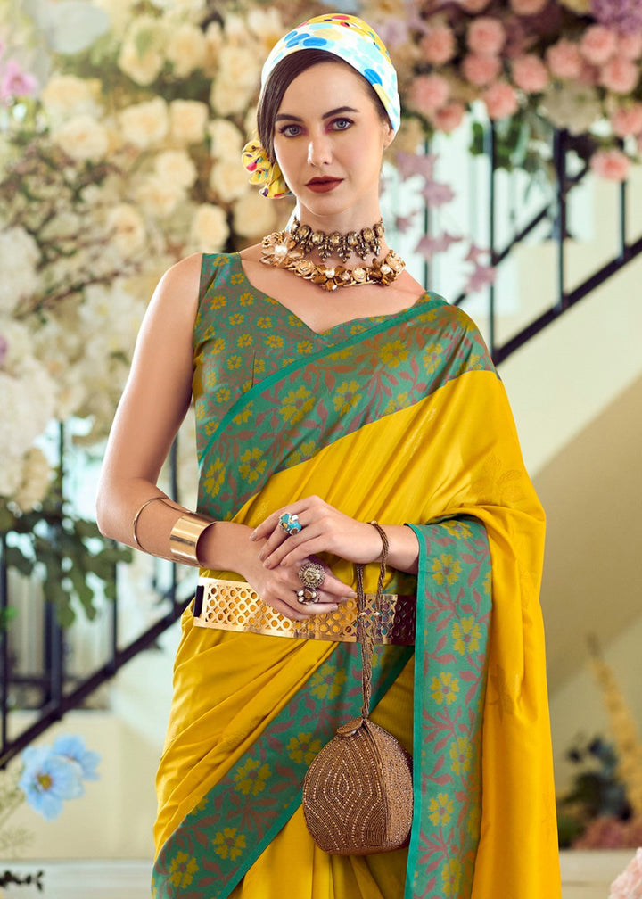 Canary Yellow Soft Silk Saree Adorned with Ikkat Border