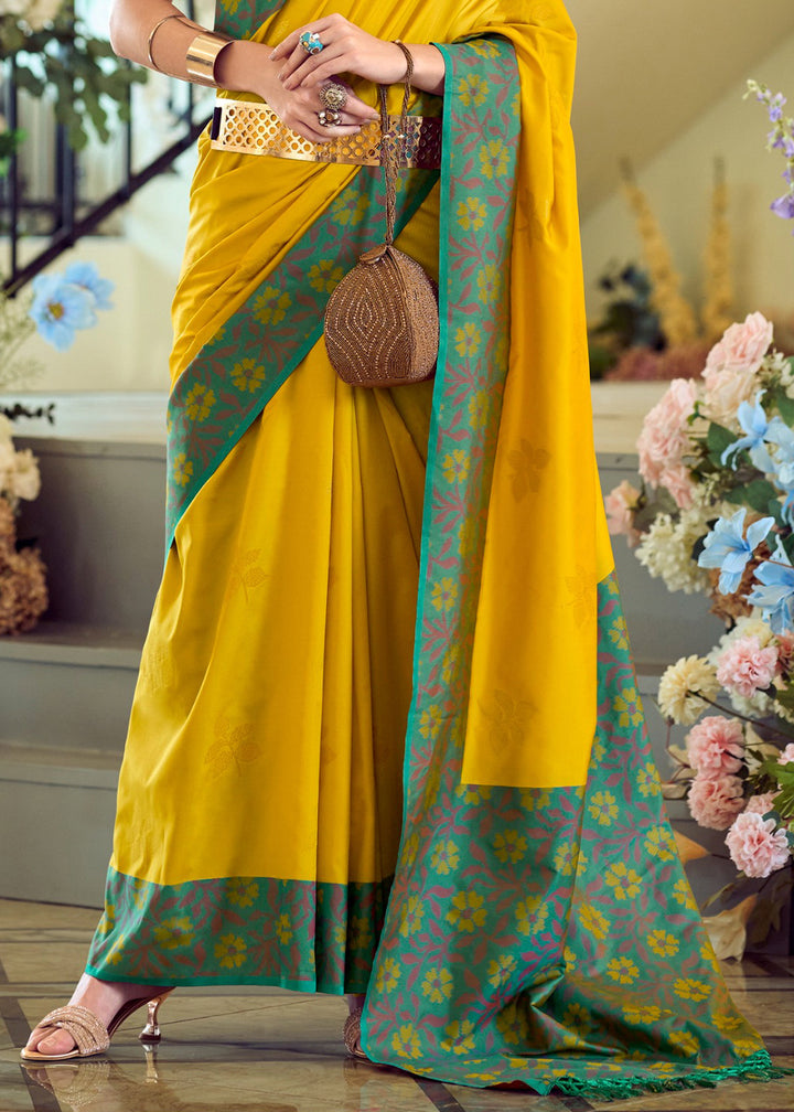 Canary Yellow Soft Silk Saree Adorned with Ikkat Border