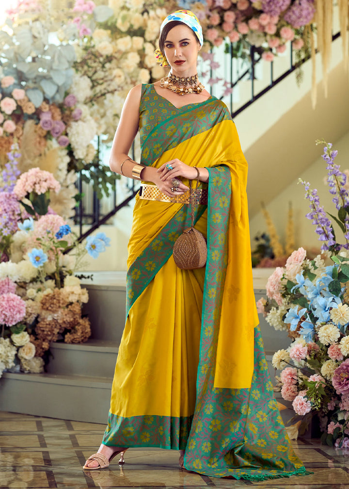 Canary Yellow Soft Silk Saree Adorned with Ikkat Border