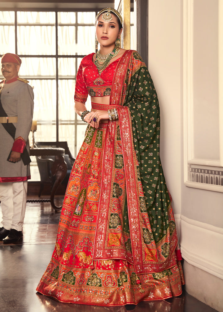 Shades Of Red Intricate Embroidered Lehenga Choli in Banarasi Silk – Bridal Wear