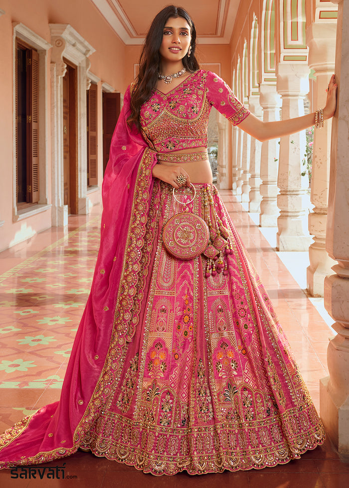 Shades Of Pink Banarasi Silk Lehenga Choli with Swarovski Embellished Khatli