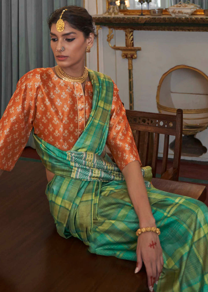 Jade Green Silk Saree Featuring Zari Weave and Orange Printed Blouse