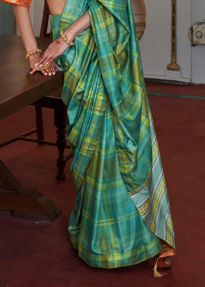 Jade Green Silk Saree Featuring Zari Weave and Orange Printed Blouse