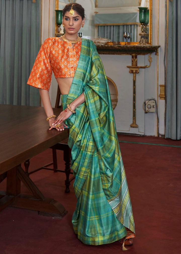 Jade Green Silk Saree Featuring Zari Weave and Orange Printed Blouse