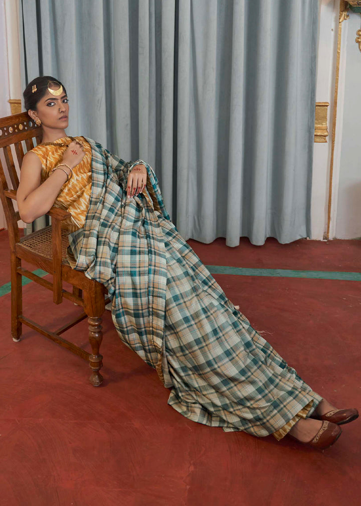 Shades Of Blue Silk Saree Featuring Zari Weave and Mustard Printed Blouse