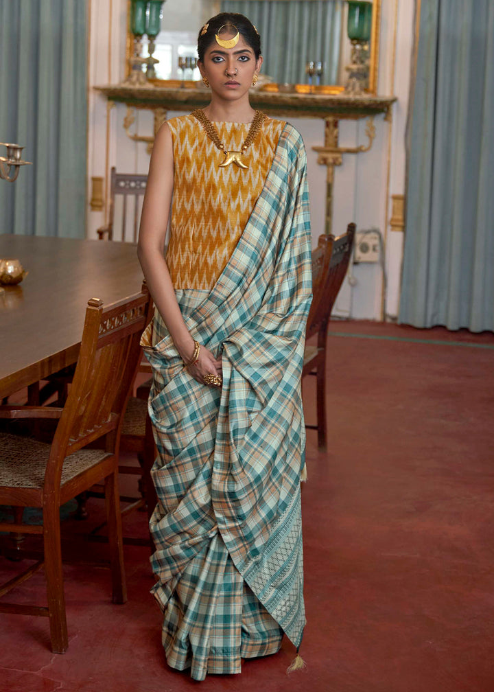 Shades Of Blue Silk Saree Featuring Zari Weave and Mustard Printed Blouse