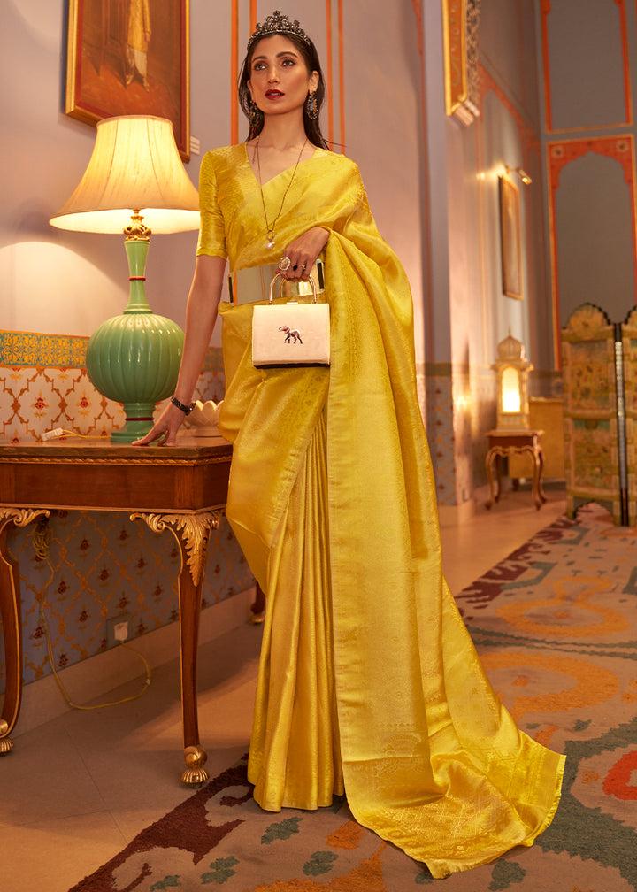 Aureolin Yellow Satin Silk Saree Featuring Zari Woven Patterns