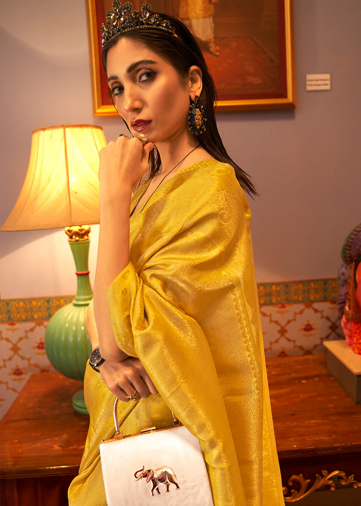 Aureolin Yellow Satin Silk Saree Featuring Zari Woven Patterns