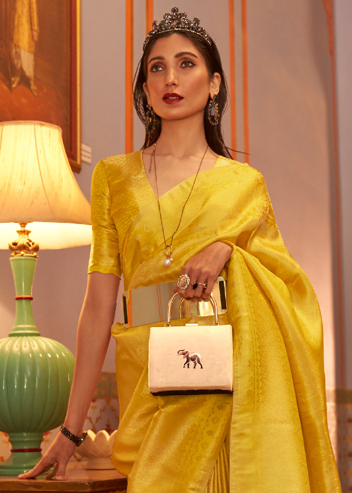 Aureolin Yellow Satin Silk Saree Featuring Zari Woven Patterns