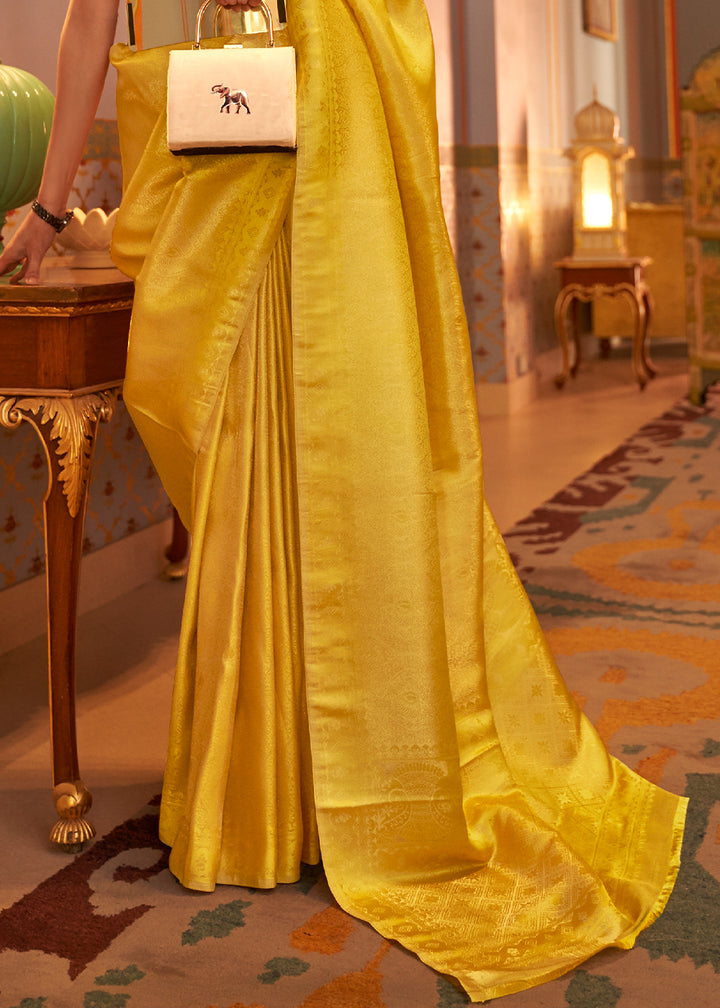 Aureolin Yellow Satin Silk Saree Featuring Zari Woven Patterns