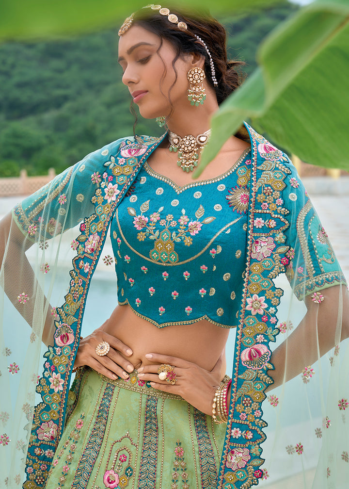 Tea Green & Blue Banarasi Silk Lehenga Choli with Stunning Floral Embroidery & Sequins Design