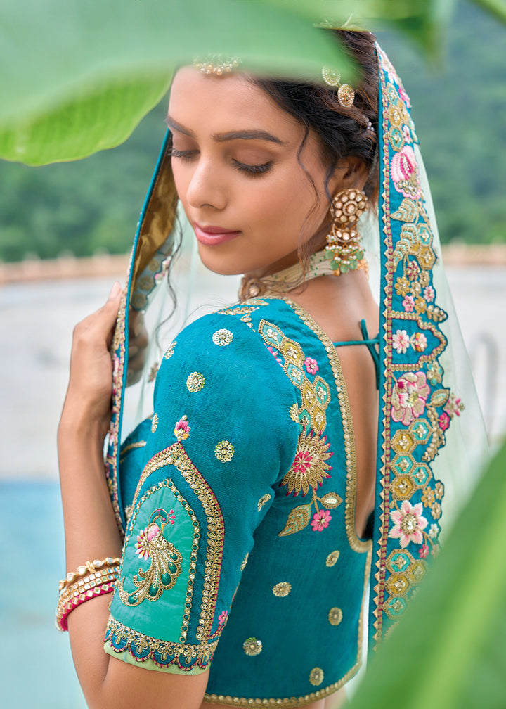 Tea Green & Blue Banarasi Silk Lehenga Choli with Stunning Floral Embroidery & Sequins Design