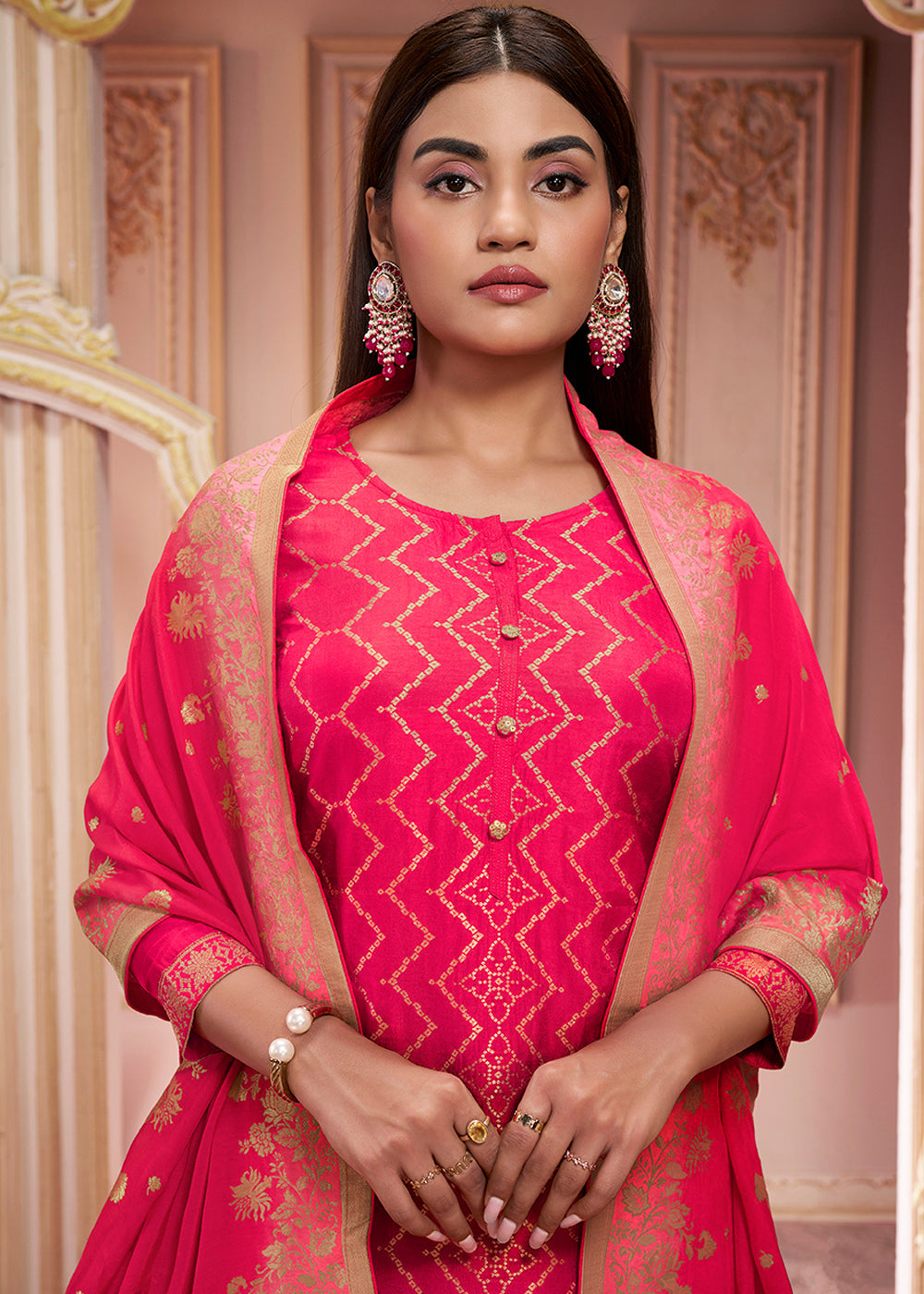 Reddish Pink Dola Silk Suit Featuring Jacquard Pattern Weaving