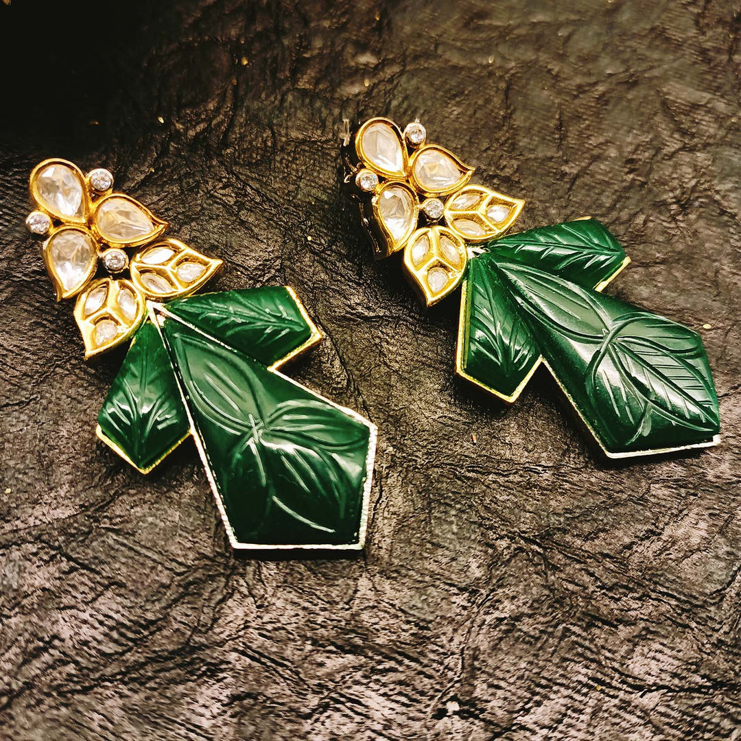 Diya Green Rhodium Plated Carved Stone Kundan Earrings