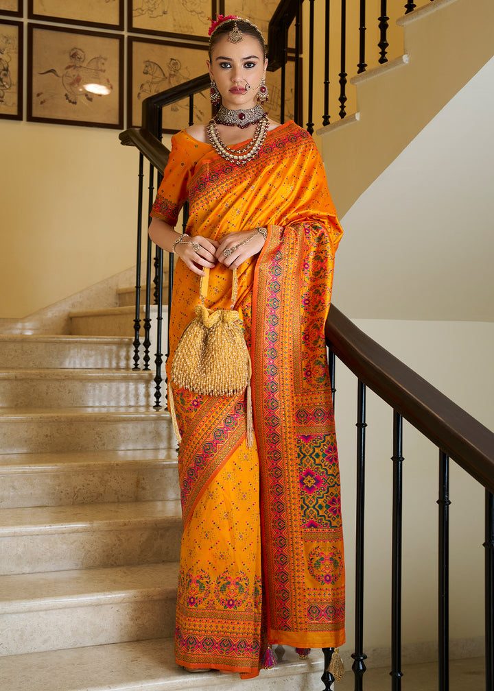 Fire Yellow Banarasi Silk Saree with Intricate Patola Weaving