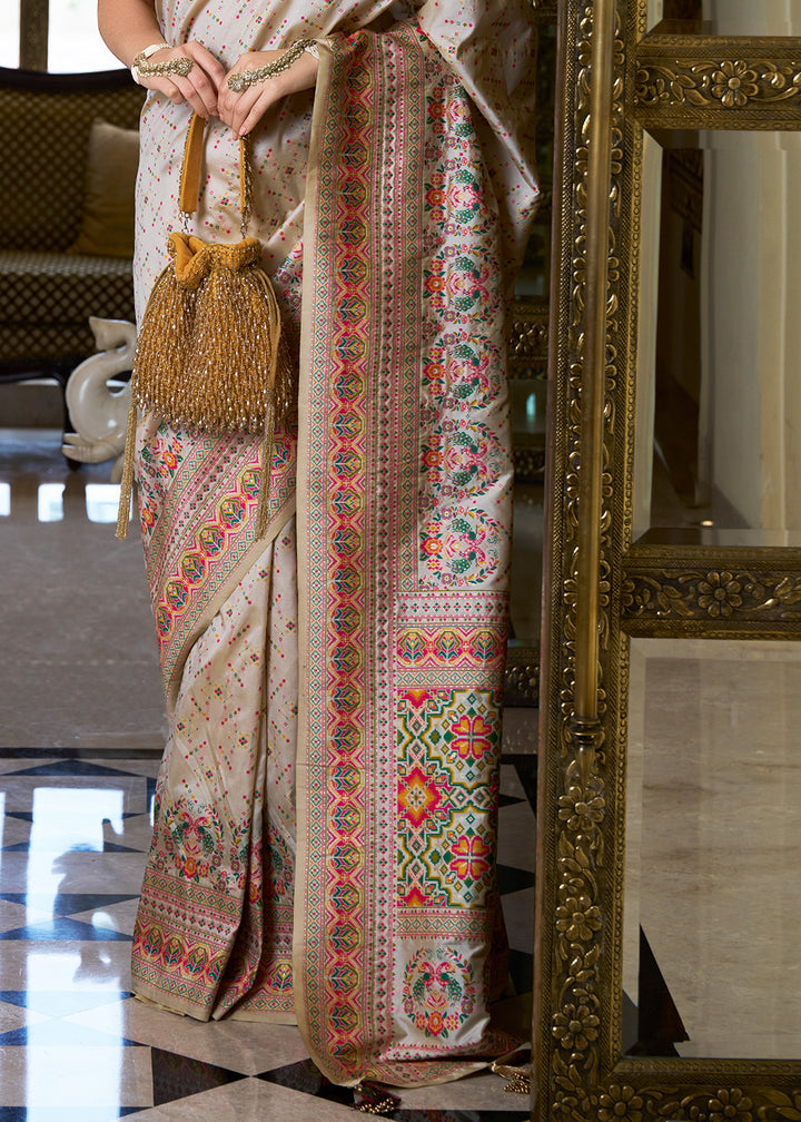 Off White Banarasi Silk Saree with Intricate Patola Weaving