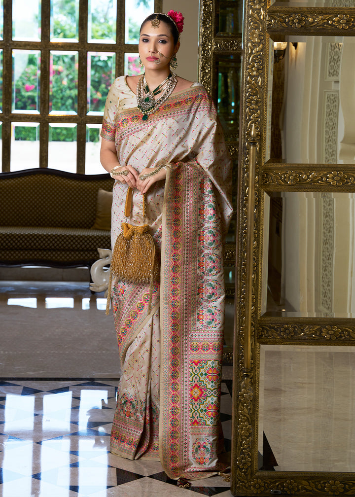 Off White Banarasi Silk Saree with Intricate Patola Weaving