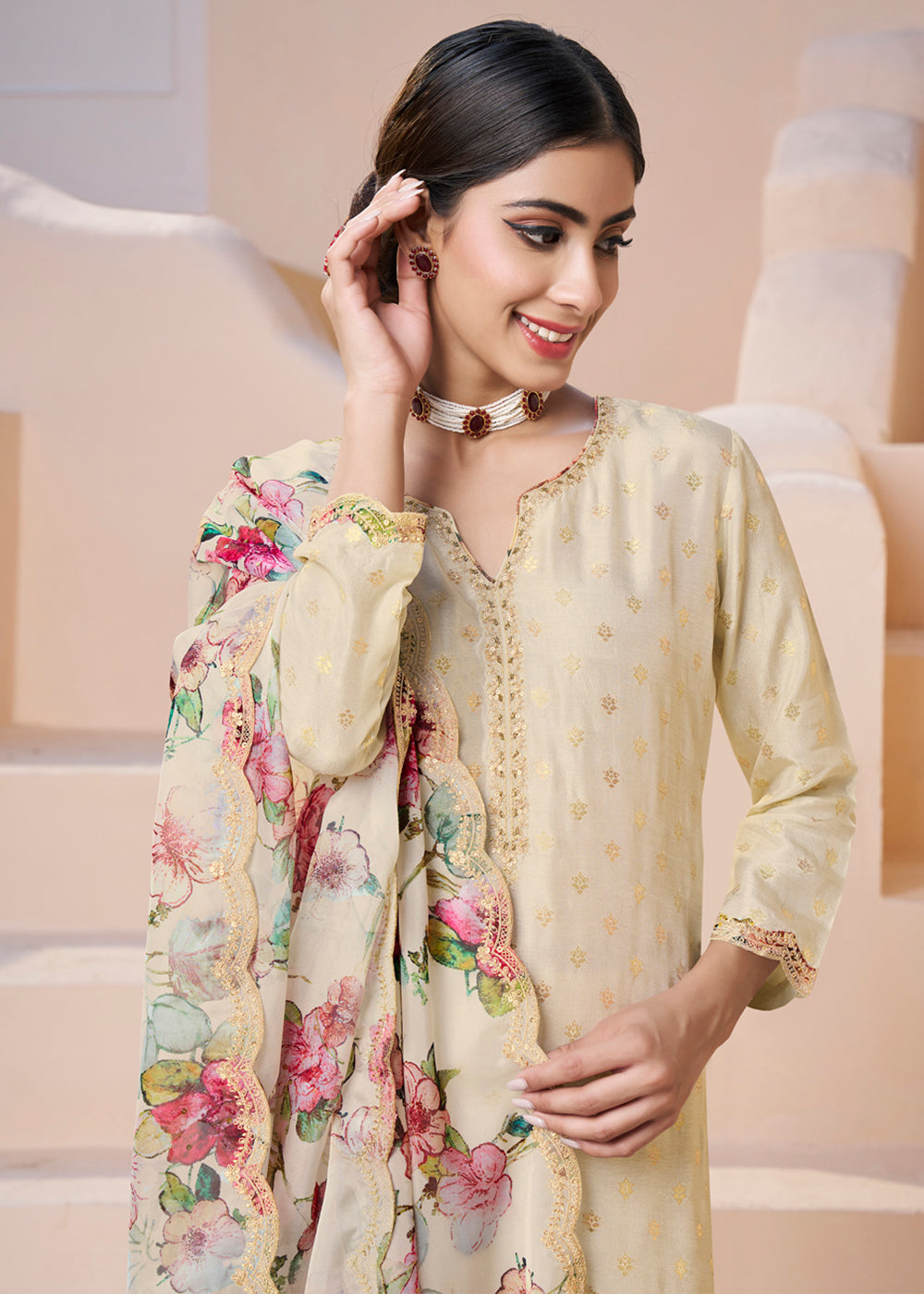 Cream White Dola Silk Suit Adorned with Applique Patch and Sequin Work