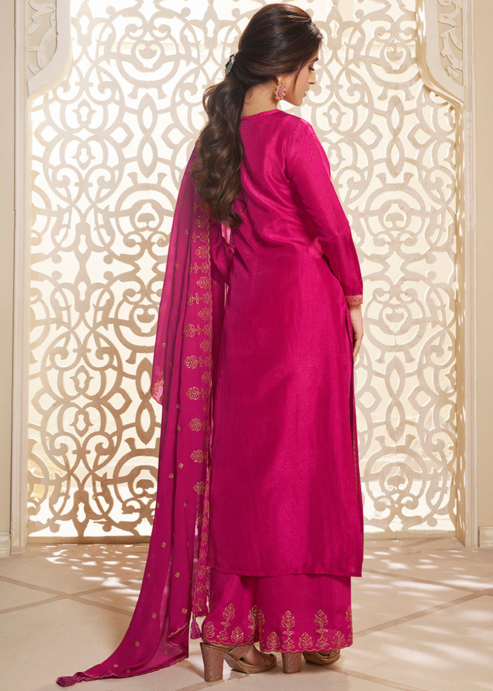 Hot Pink Dola Silk Suit Adorned with Zari and Self Jacquard Weave