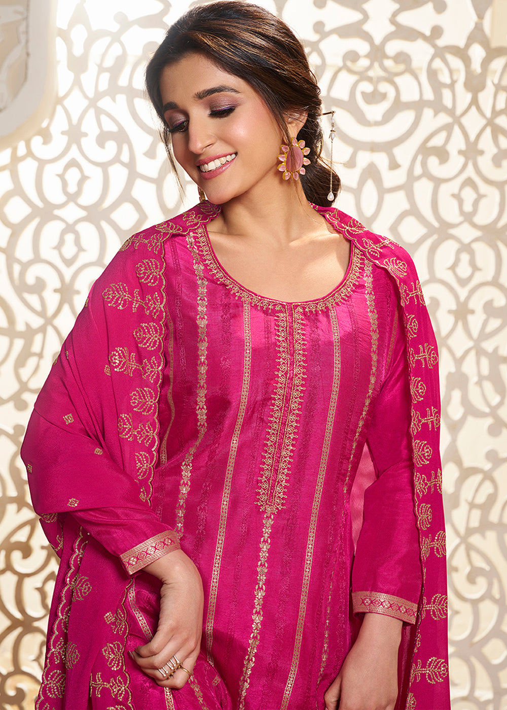 Hot Pink Dola Silk Suit Adorned with Zari and Self Jacquard Weave