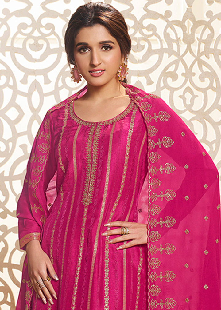 Hot Pink Dola Silk Suit Adorned with Zari and Self Jacquard Weave