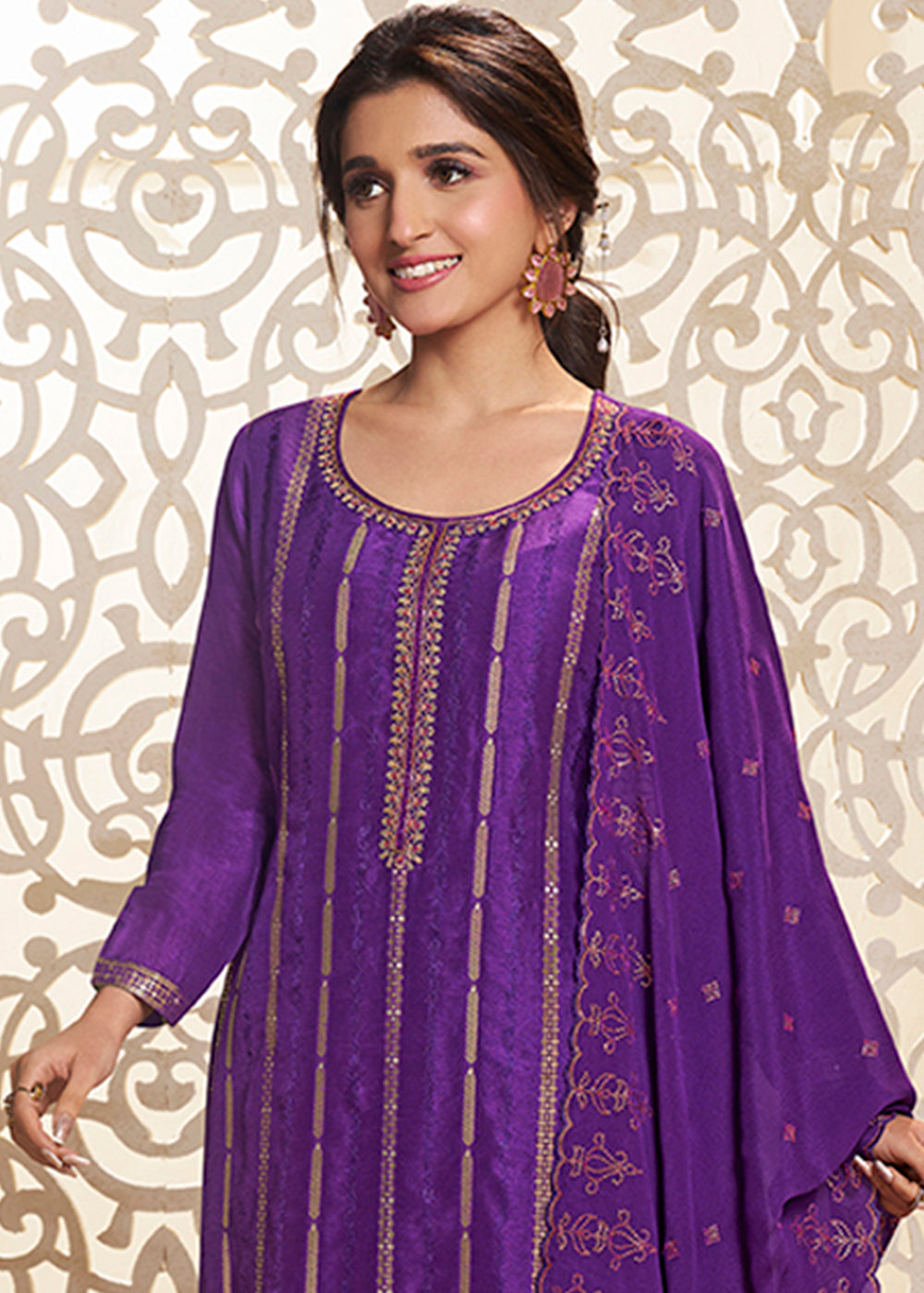 Grape Purple Dola Silk Suit Adorned with Zari and Self Jacquard Weave