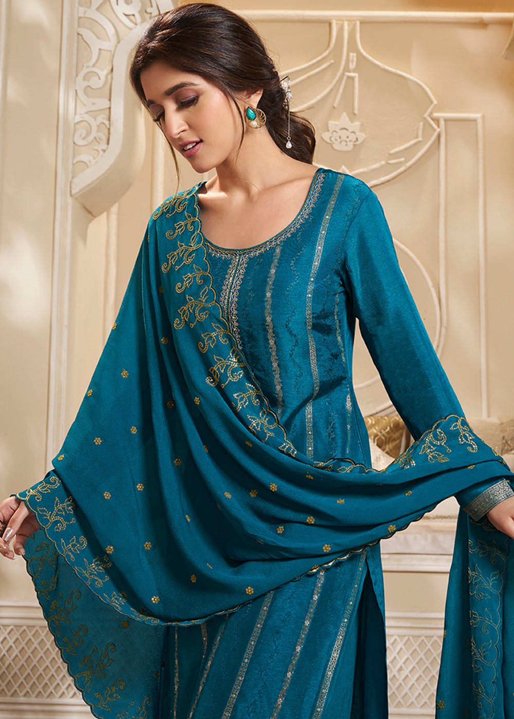 Beautiful Blue Dola Silk Suit Adorned with Zari and Self Jacquard Weave