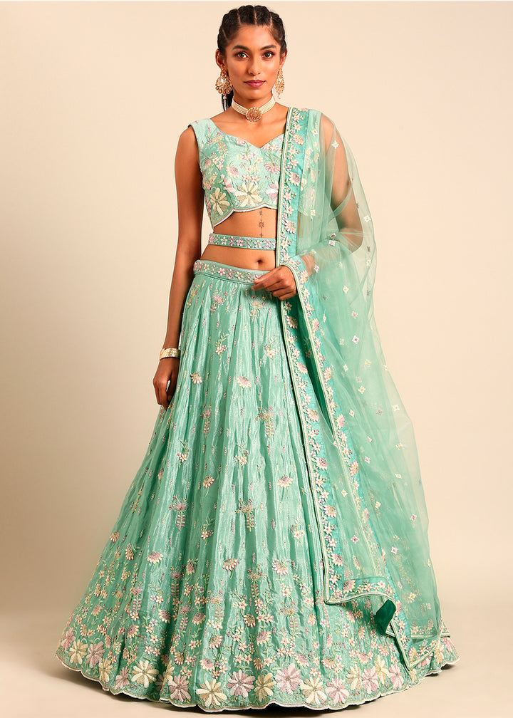 Pistachio Green Net Lehenga Choli Highlighted with heavy Sequins Embroidery