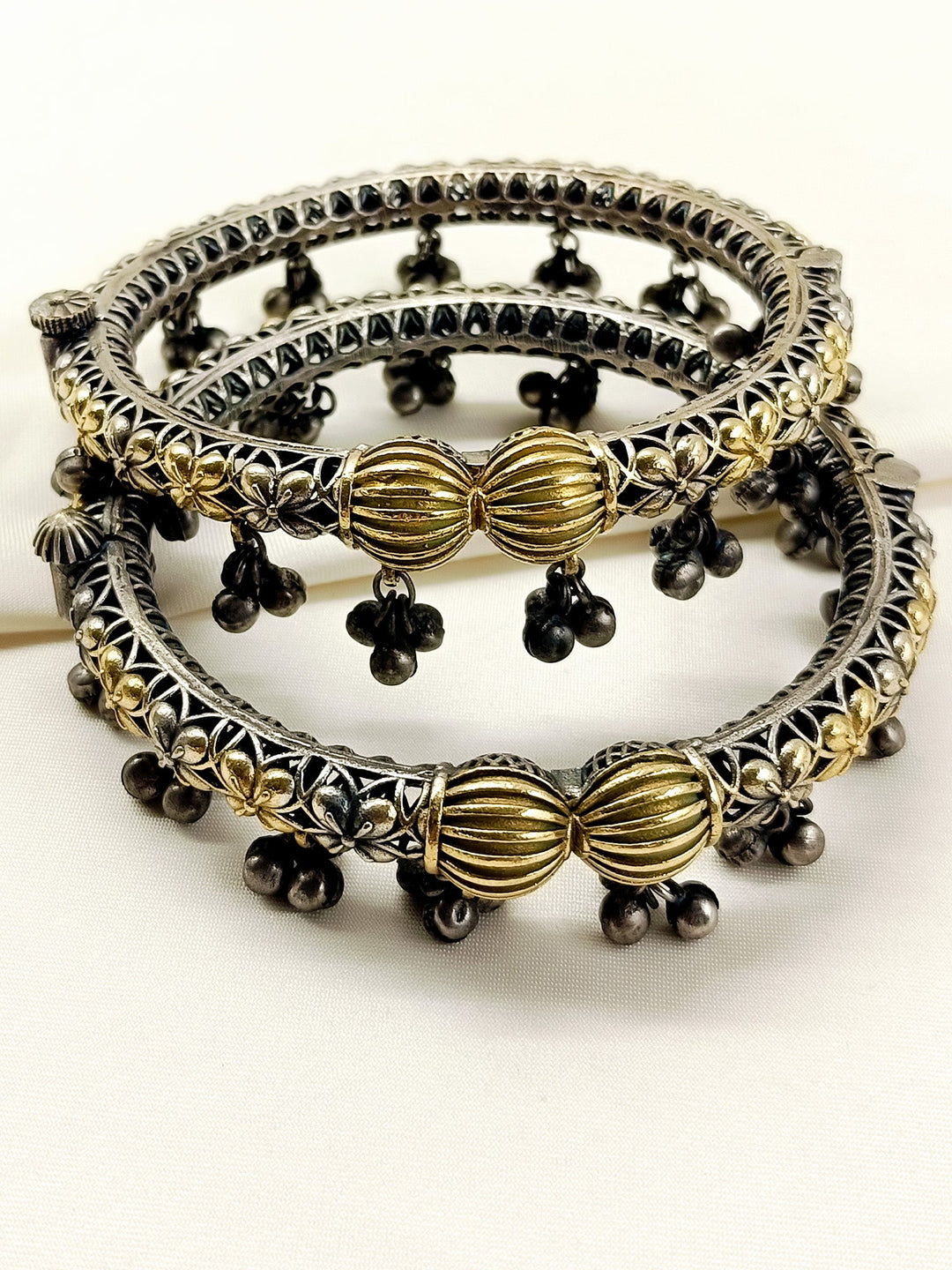 Charulata Dual-Tone Oxidized Floral Ghungroo Anklets