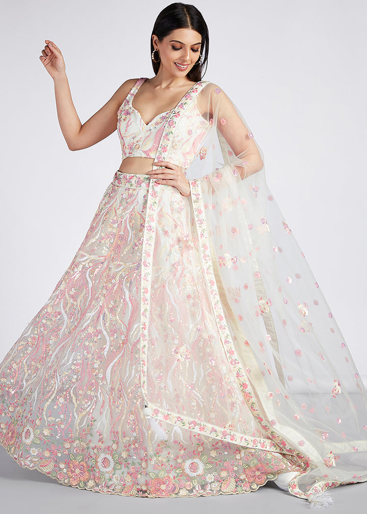 Rice White Net Lehenga Choli Highlighted with Sequins & Thread Embroidery