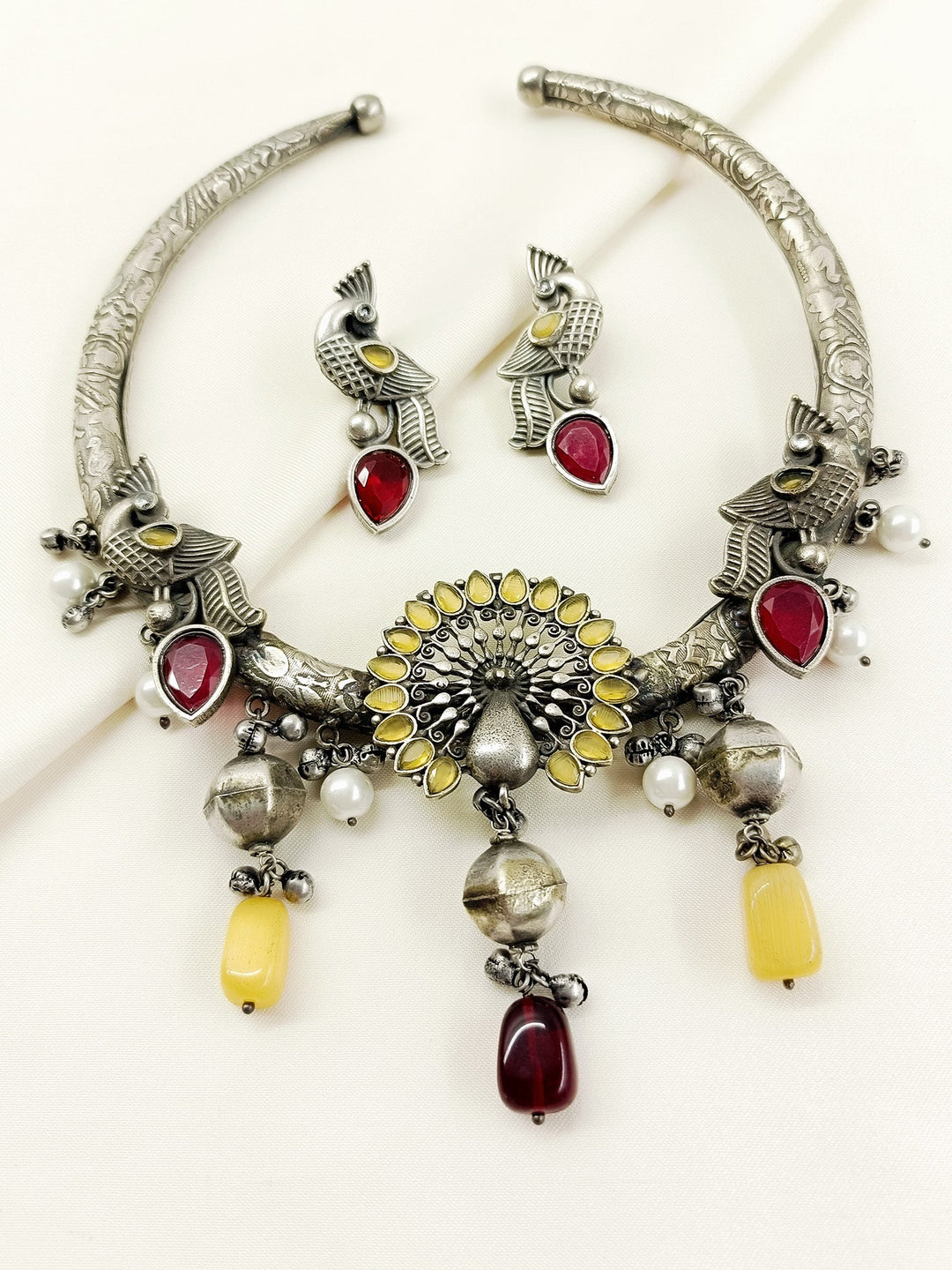 Padmavati Yellow Peacock Oxidized Hasli Style Necklace Set