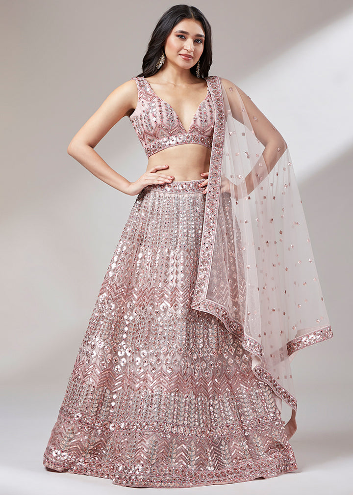 Rose Gold Pink Net Lehenga Choli Highlighted with Sequins Embroidery & Net Mirror work