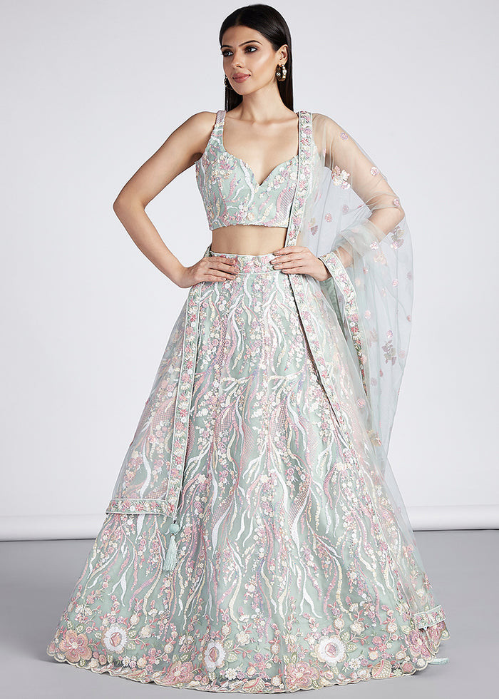 Light Green Net Lehenga Choli Highlighted with Sequins & Thread Embroidery