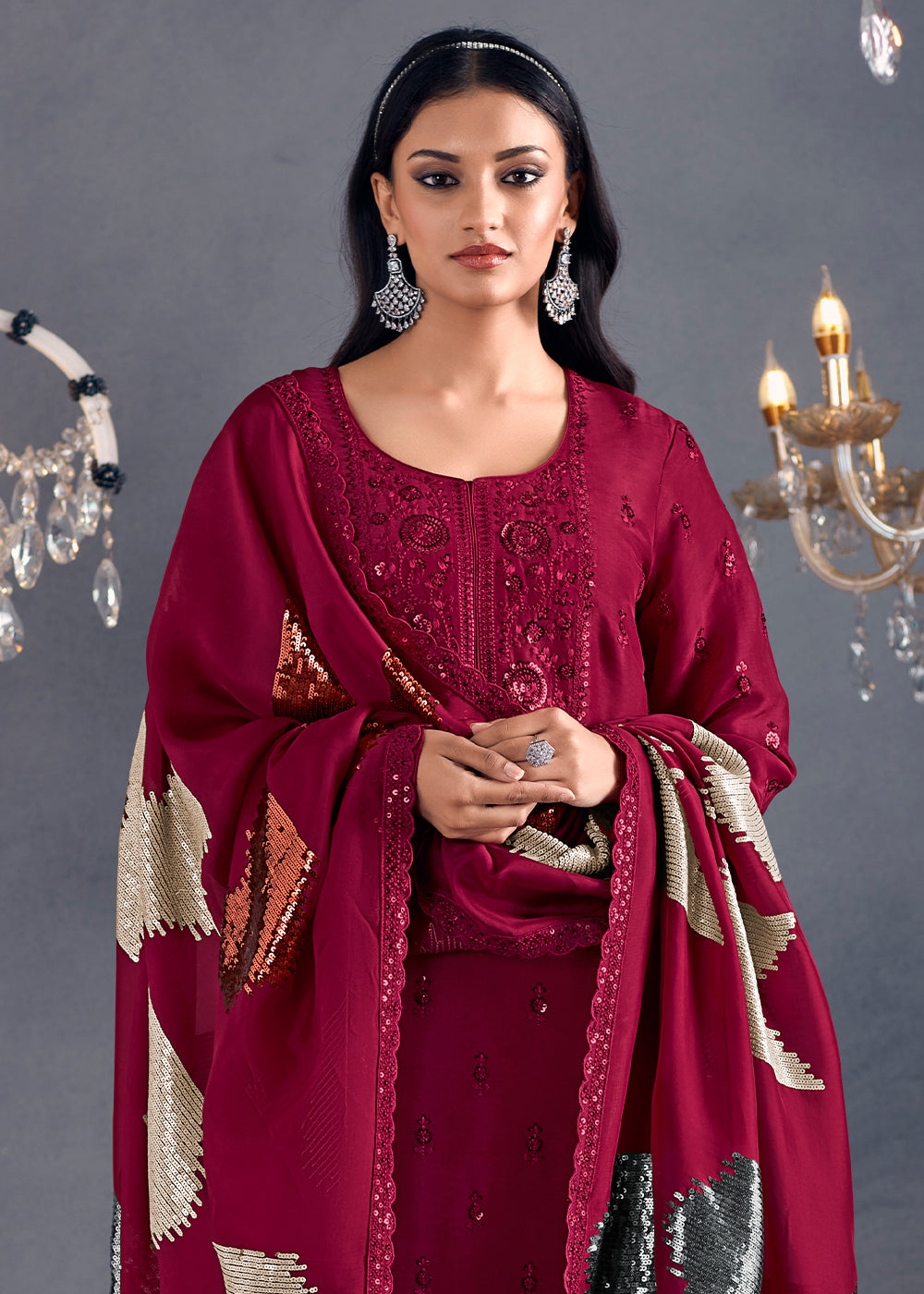 Reddish Pink Silk Suit Featuring Embroidered Buttis, Neckline, and Scalloped Sleeves