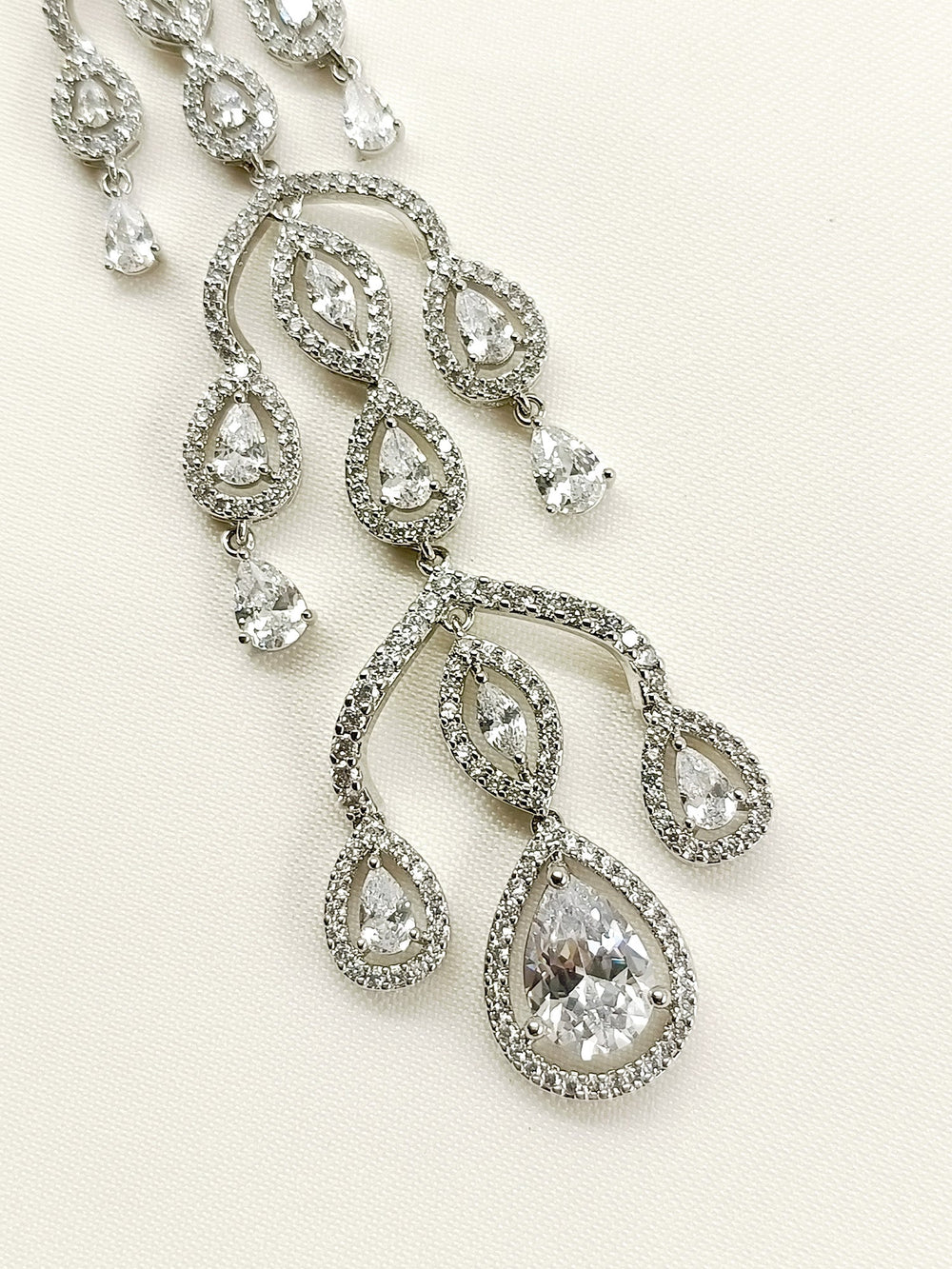 Enakshi White American Diamond Teeka