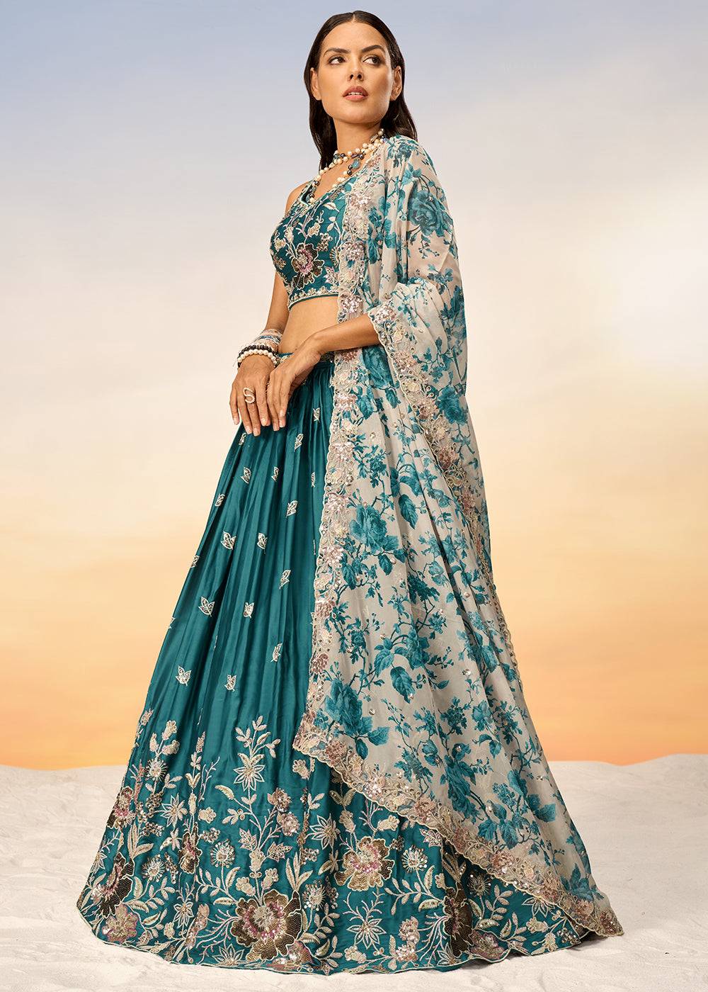 Teal Blue Chiffon Lehenga Choli Adorned with Sequins Embroidery Work