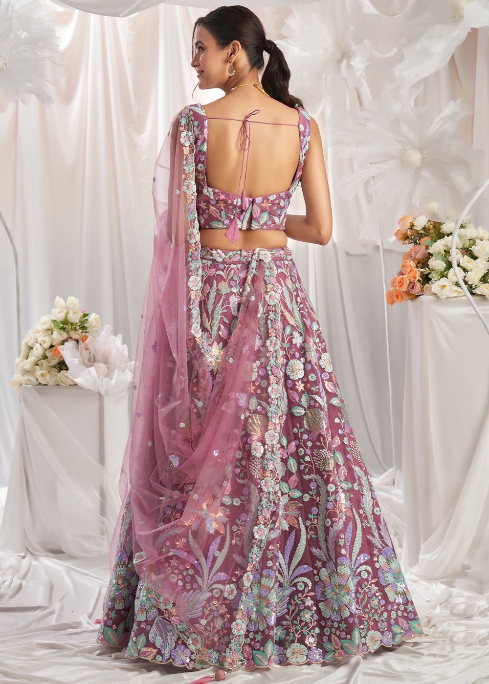 Wildberry Purple Net Lehenga Choli Adorned with Sequins Embroidery Work