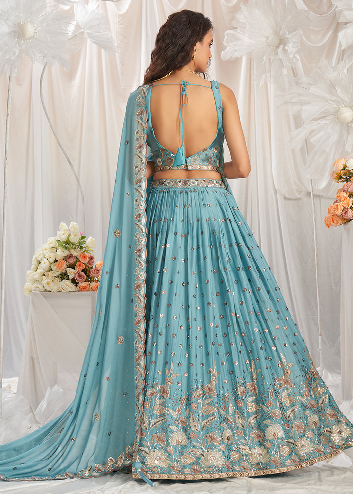 Turquoise Blue Georgette Lehenga Choli Adorned with Sequins Work