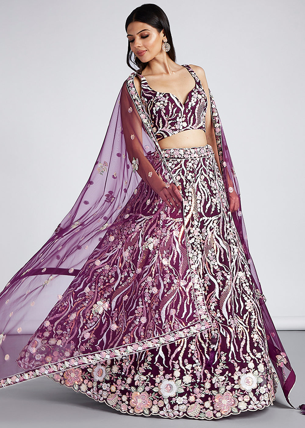 Burgundy Purple Net Lehenga Choli Highlighted with Sequins & Thread Embroidery