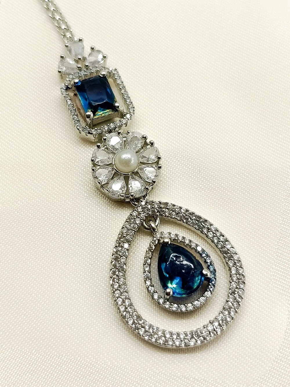 Kairav Blue Sapphire American Diamond Teeka