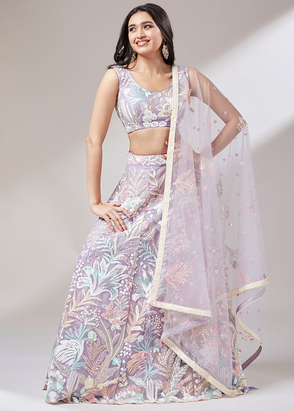 Thistle Purple Net Lehenga Choli Adorned with Thread Embroidery and Sequins