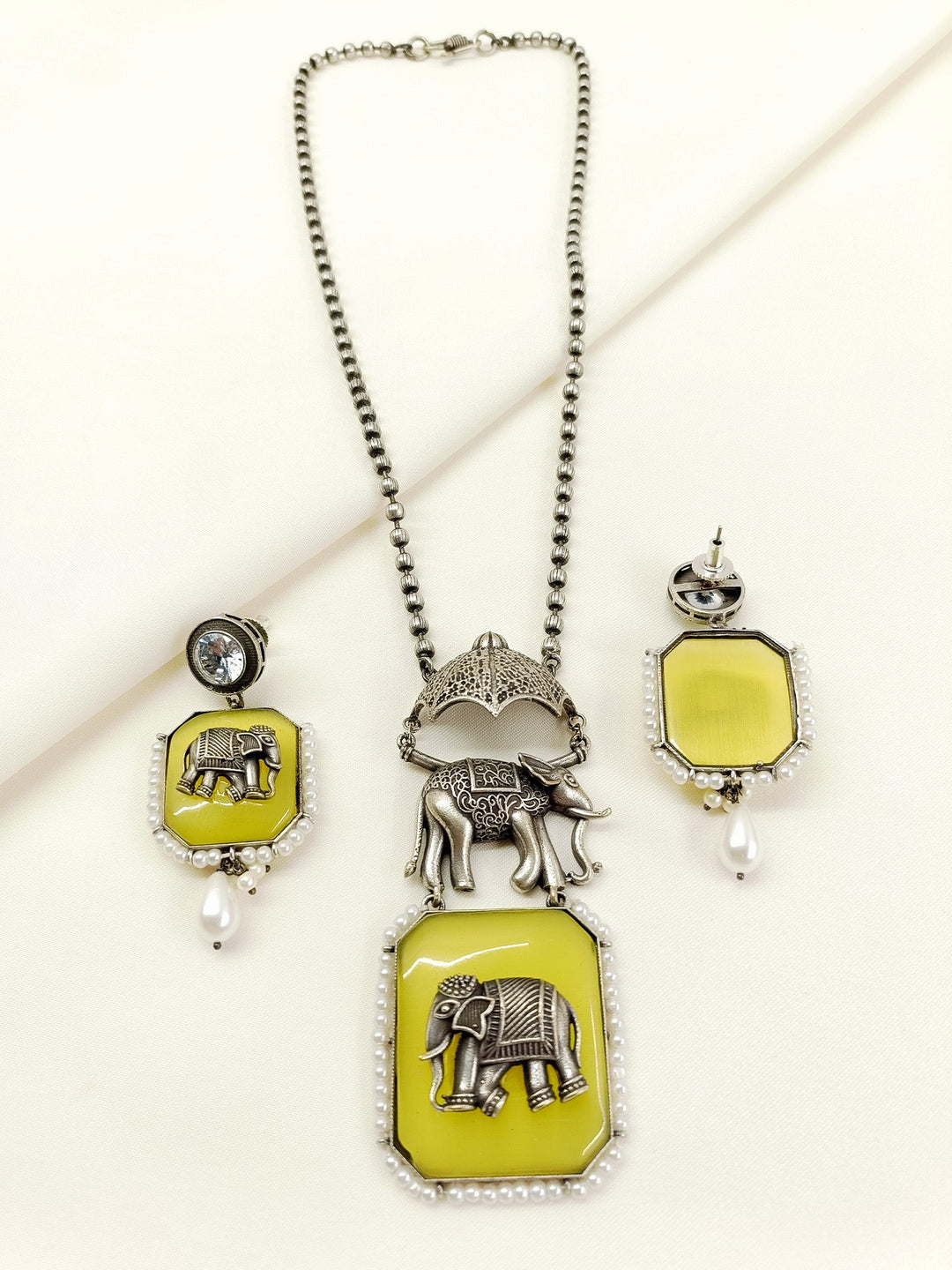 Pramila Yellow Oxidized Elephant Pendant Set