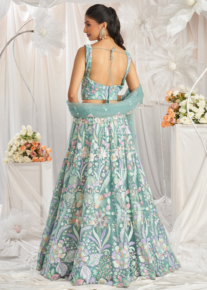 Greenish Blue Net Lehenga Choli Adorned with Sequins Embroidery Work